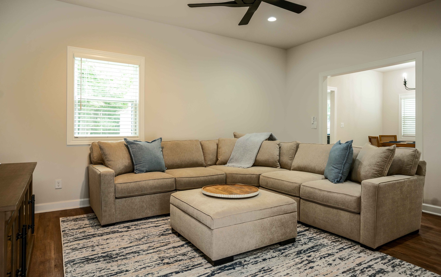 Living area with sectional sofa and Smart TV