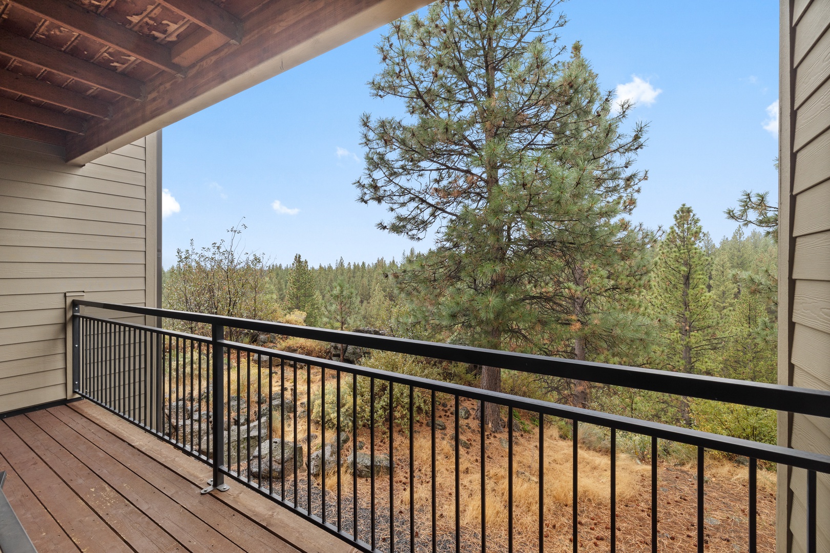 Lounge the day away & enjoy the view on the tranquil back deck