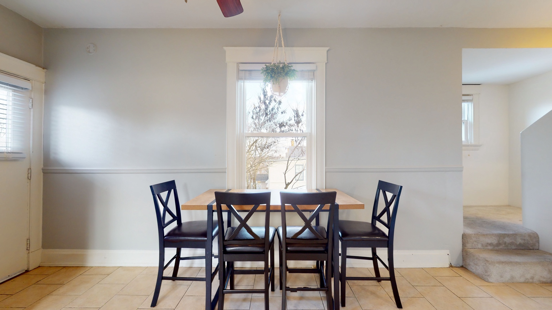 Gather for meals together at the dining table, offering seating for 4