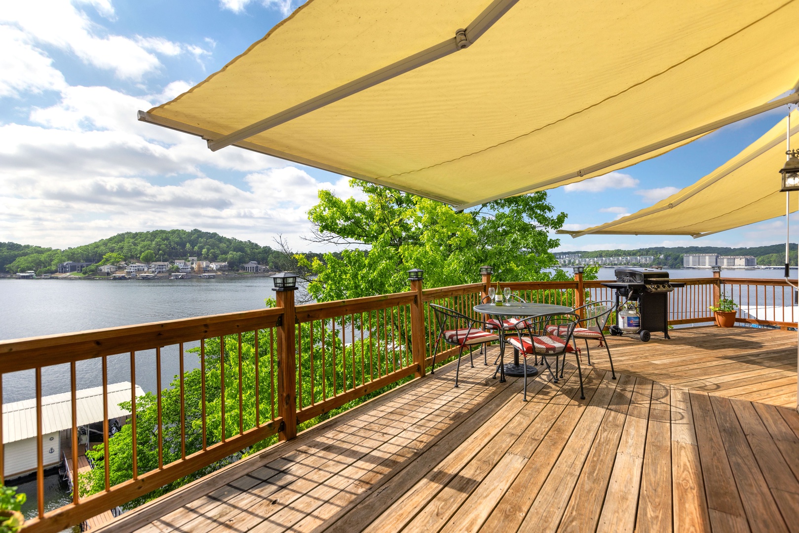 Ample top deck space with a grill and shaded areas for your enjoyment