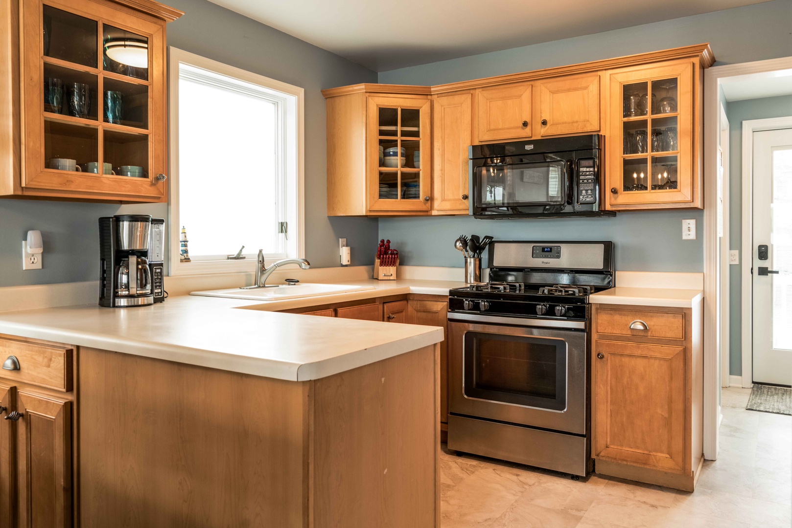 The inviting kitchen offers ample space & all the comforts of home