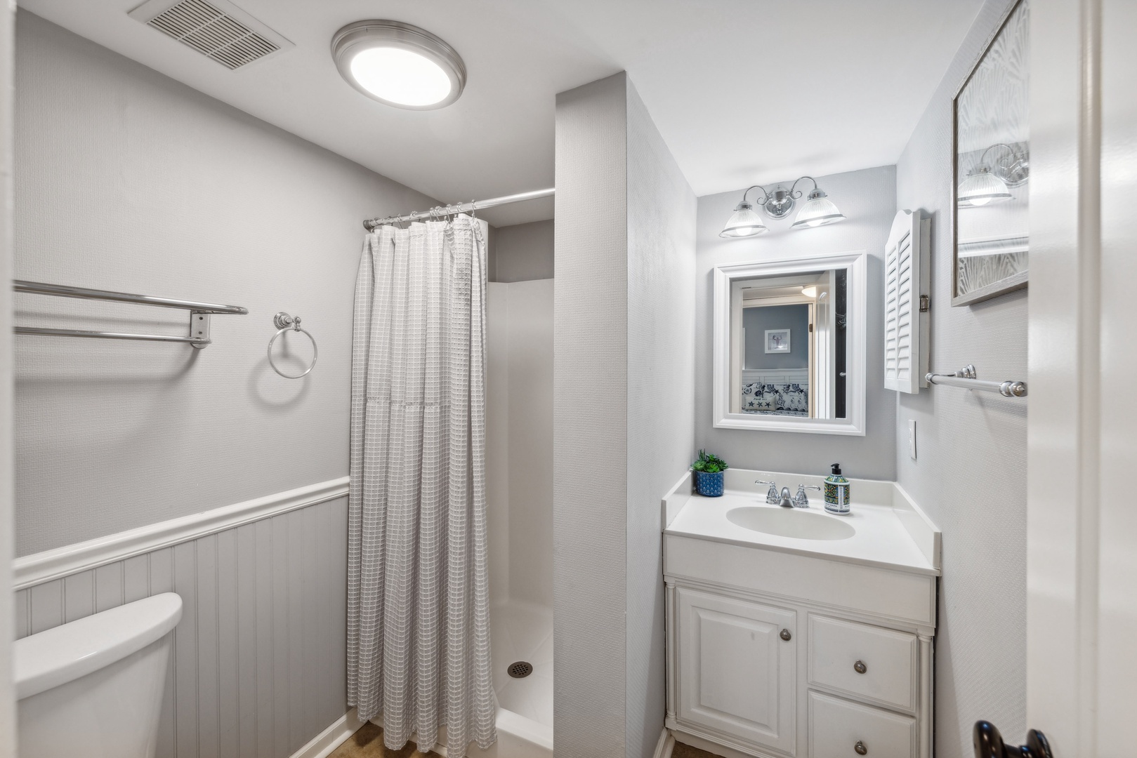 Shared bathroom with stand-up shower