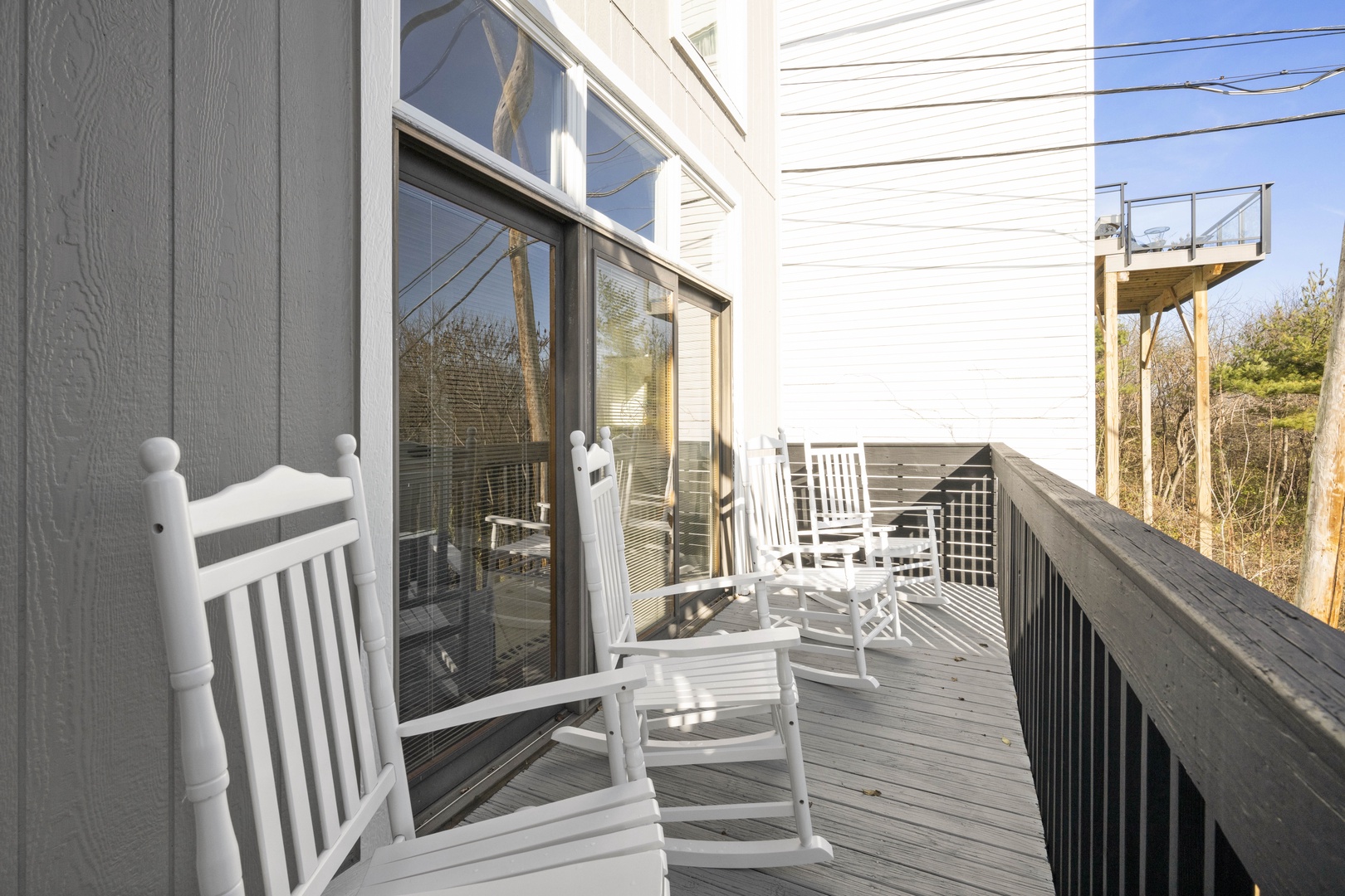 Balcony with outdoor rocking chairs