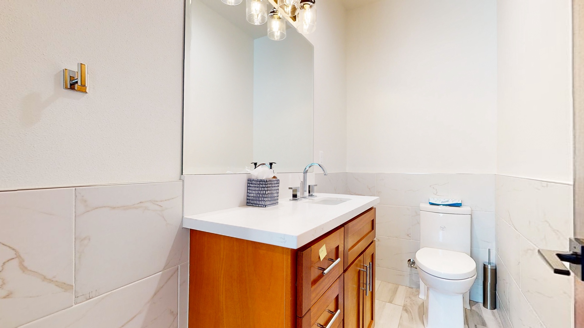 The 2nd floor offers a convenient half bath, located behind the kitchen