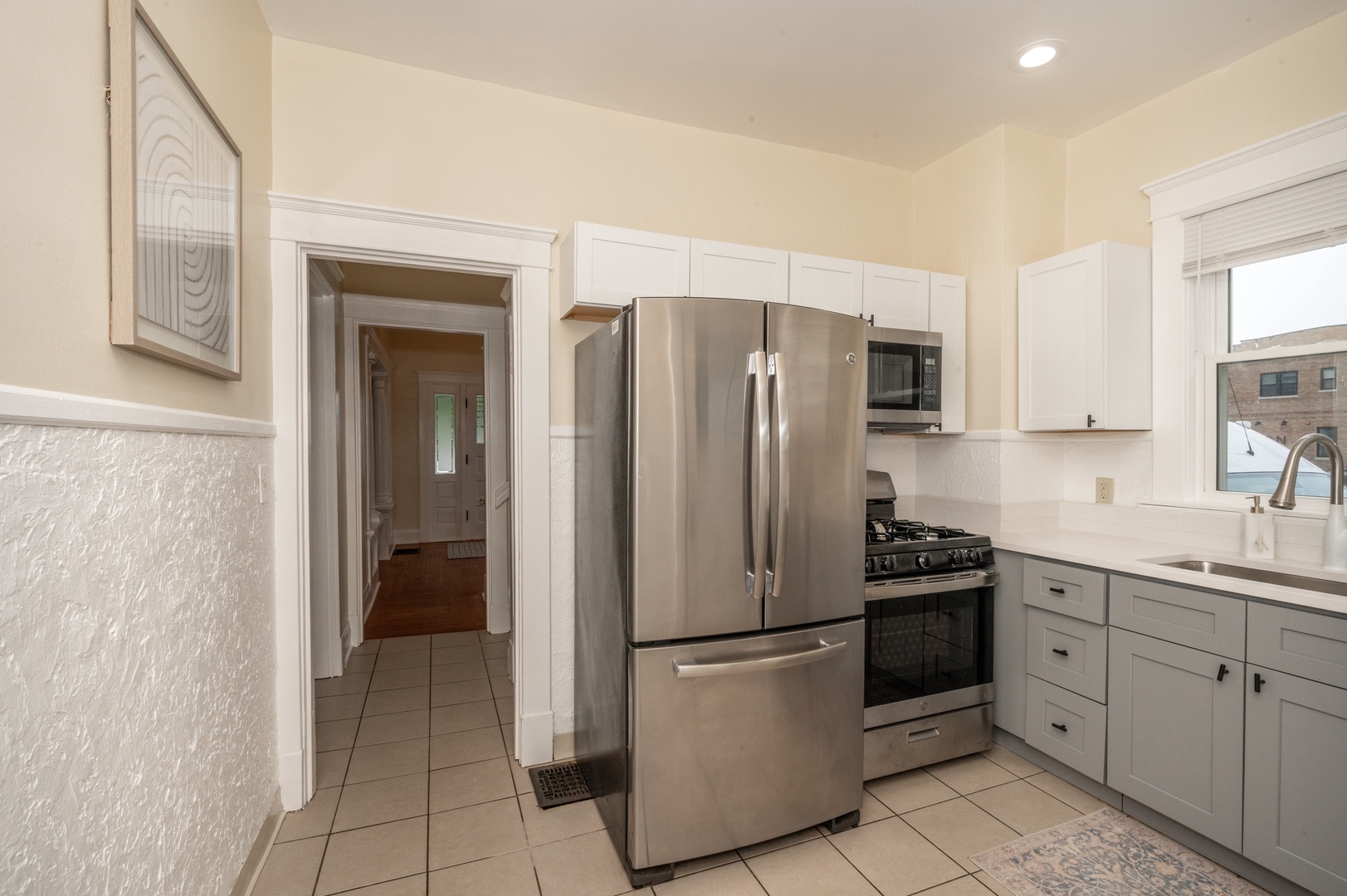 The updated kitchen offers ample storage space & fantastic amenities