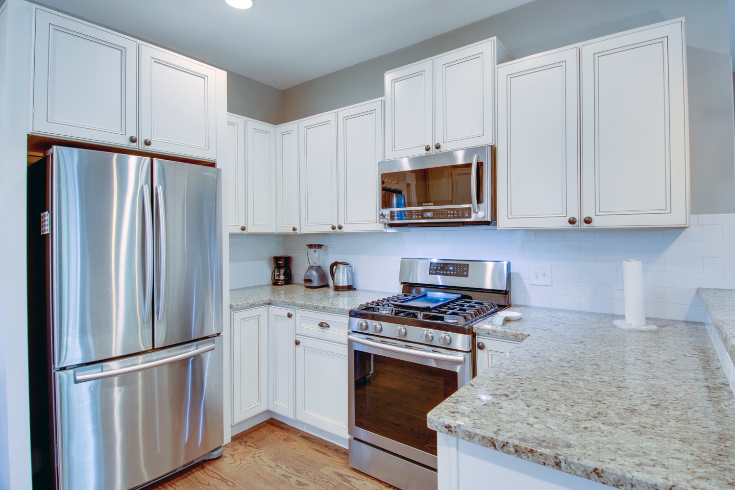 Full kitchen with dishwasher, coffee maker, and more