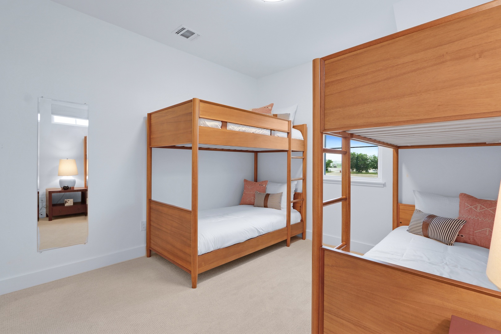 The final bedroom sanctuary includes a pair of twin-over-twin bunk beds