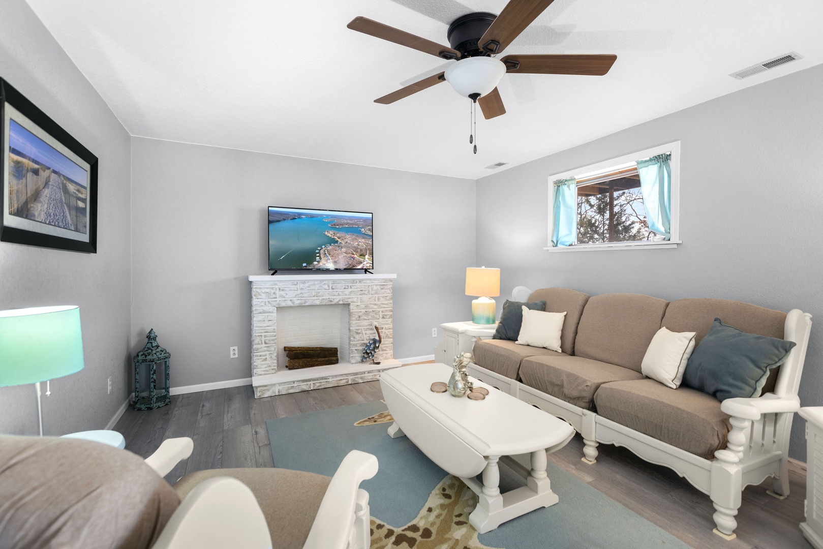 Bright living space with smart TV and ample seating