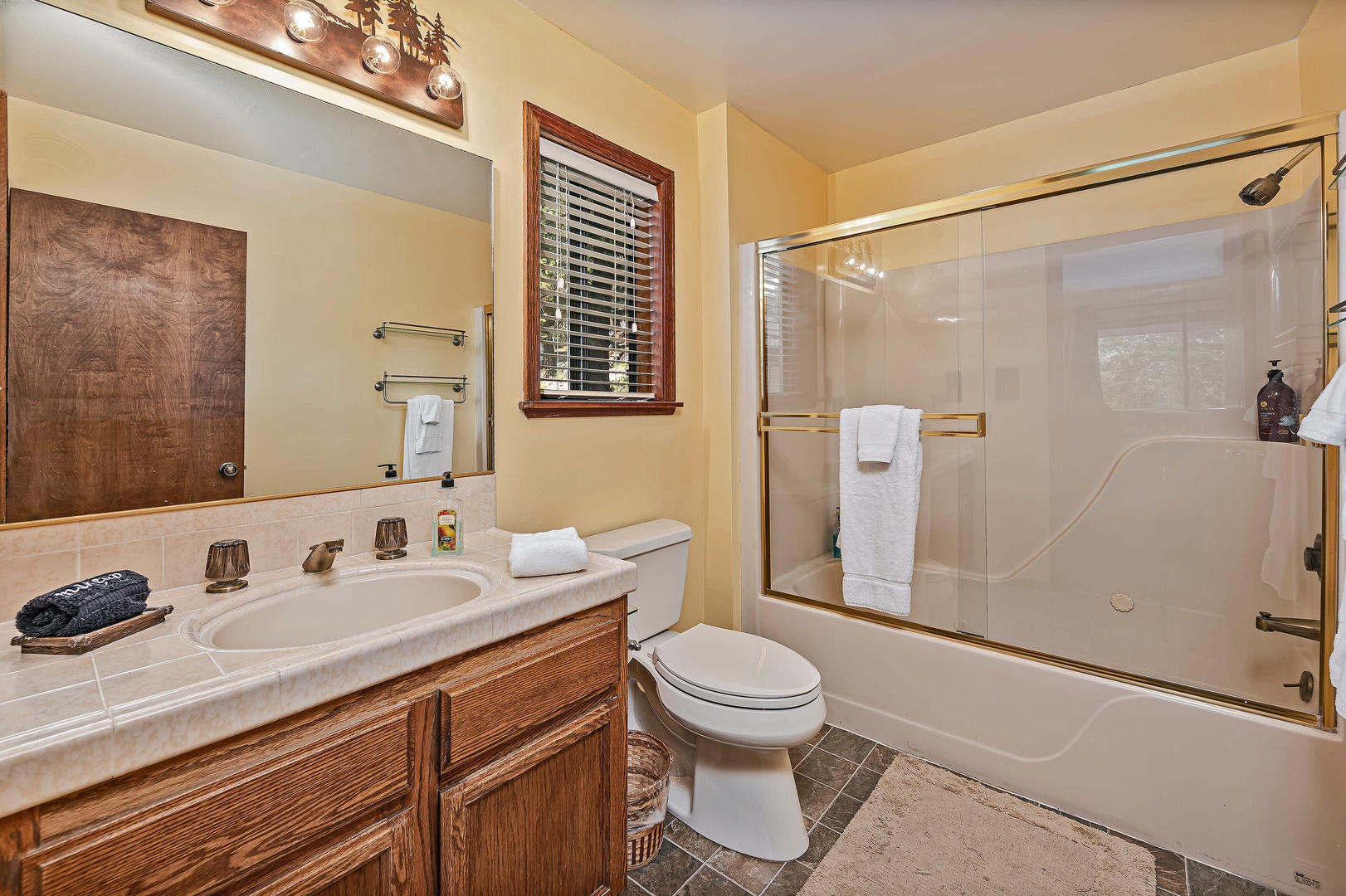 En suite master bathroom with shower/tub combo