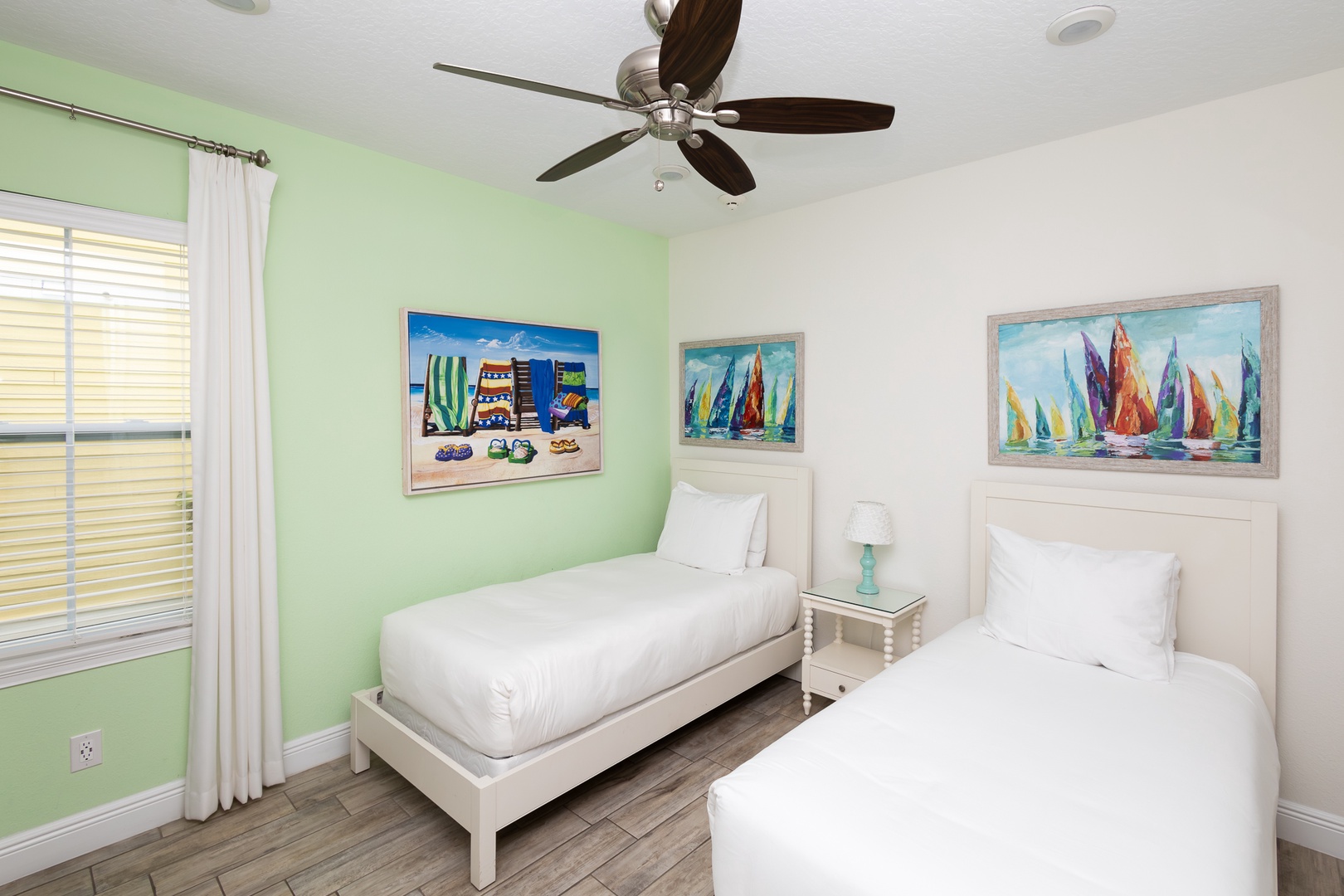 This 2nd floor bedroom suite offers two plush twin beds ensuite & smart TV