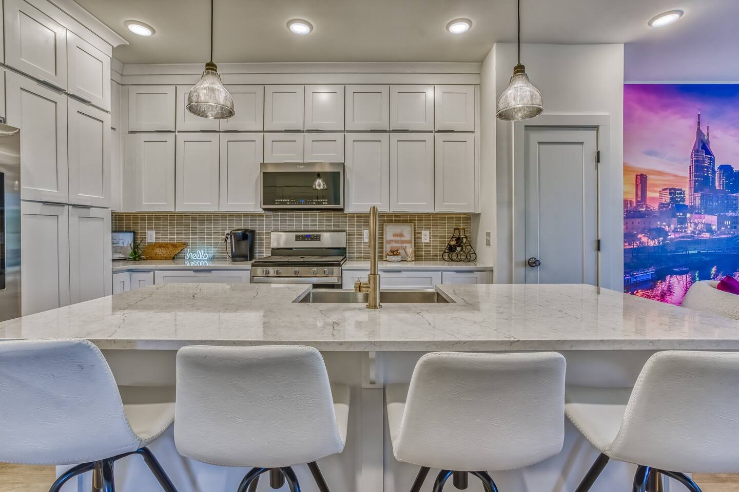 Sip morning coffee or grab a bite at the kitchen counter, with seating for 4