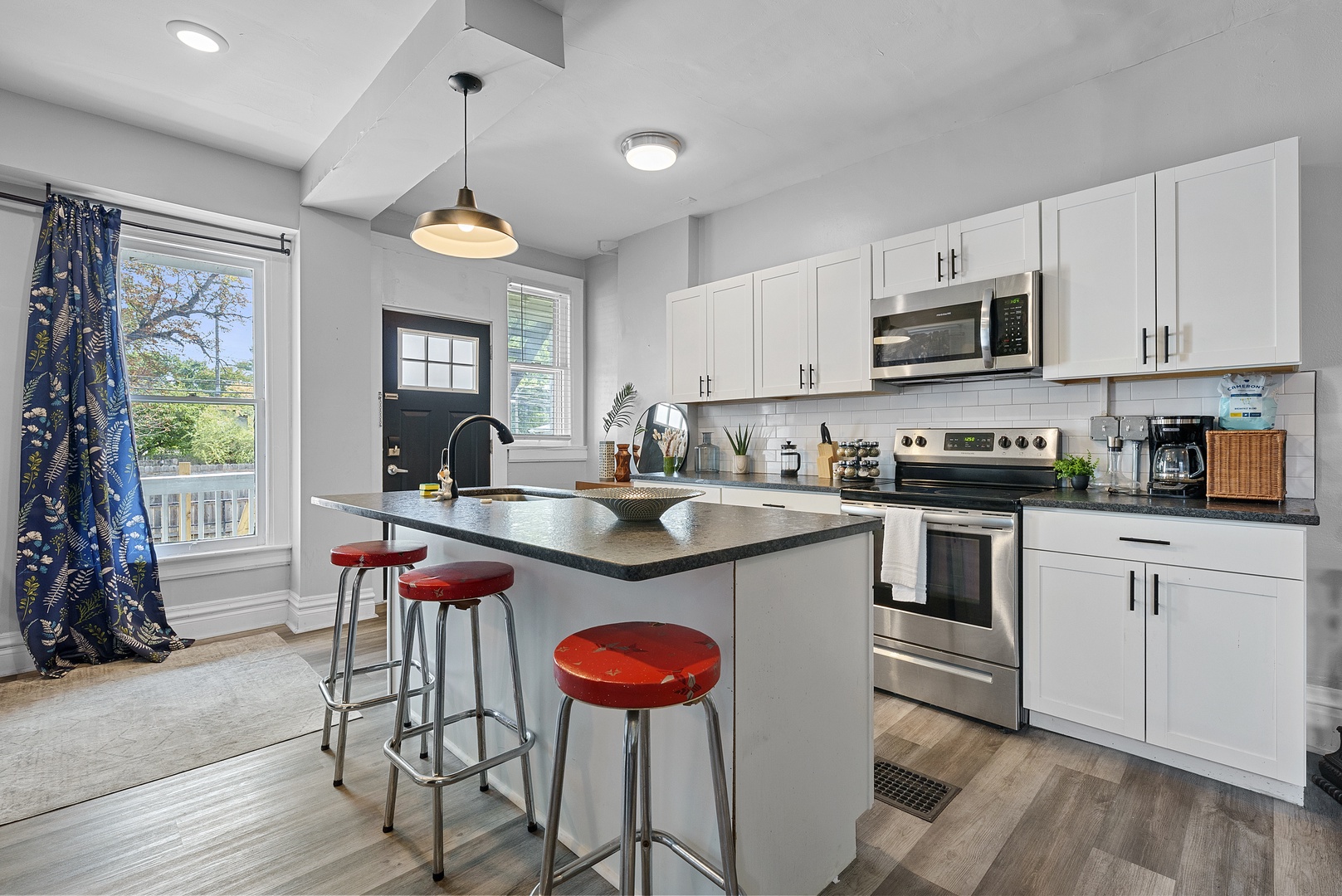 Apartment 1164’s open, airy kitchen offers ample space & every home comfort