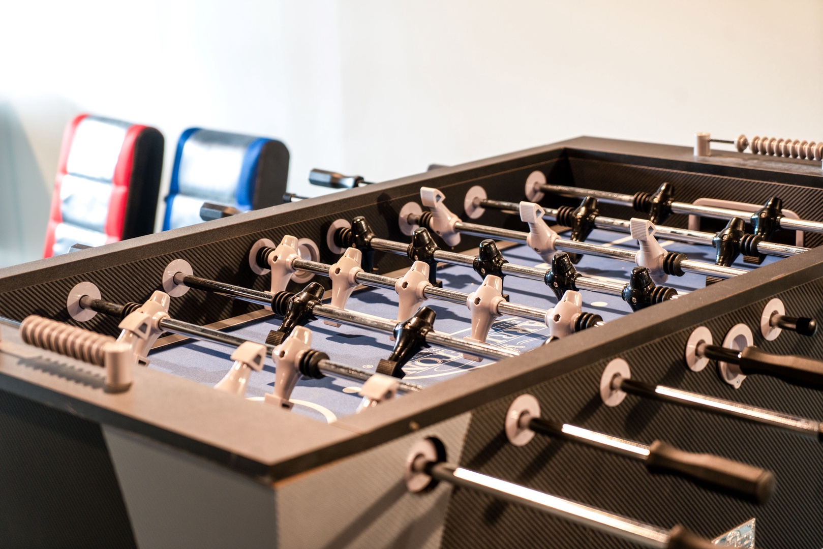 Get competitive in the lower-level game room with a round of foosball