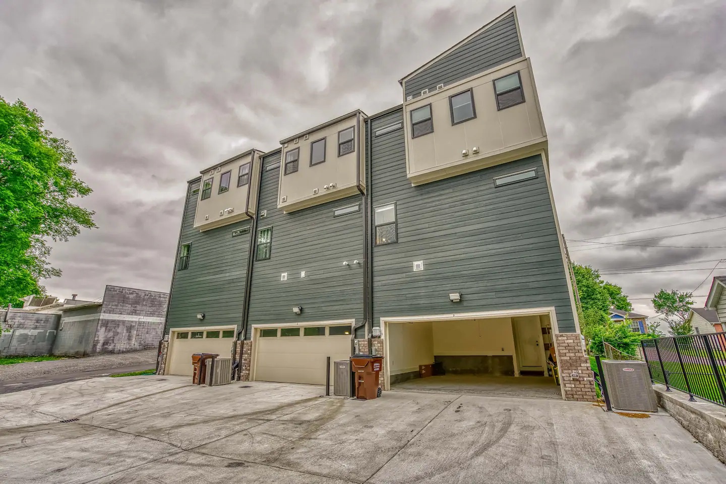 This exceptional townhome offers garage parking for 2 compact vehicles