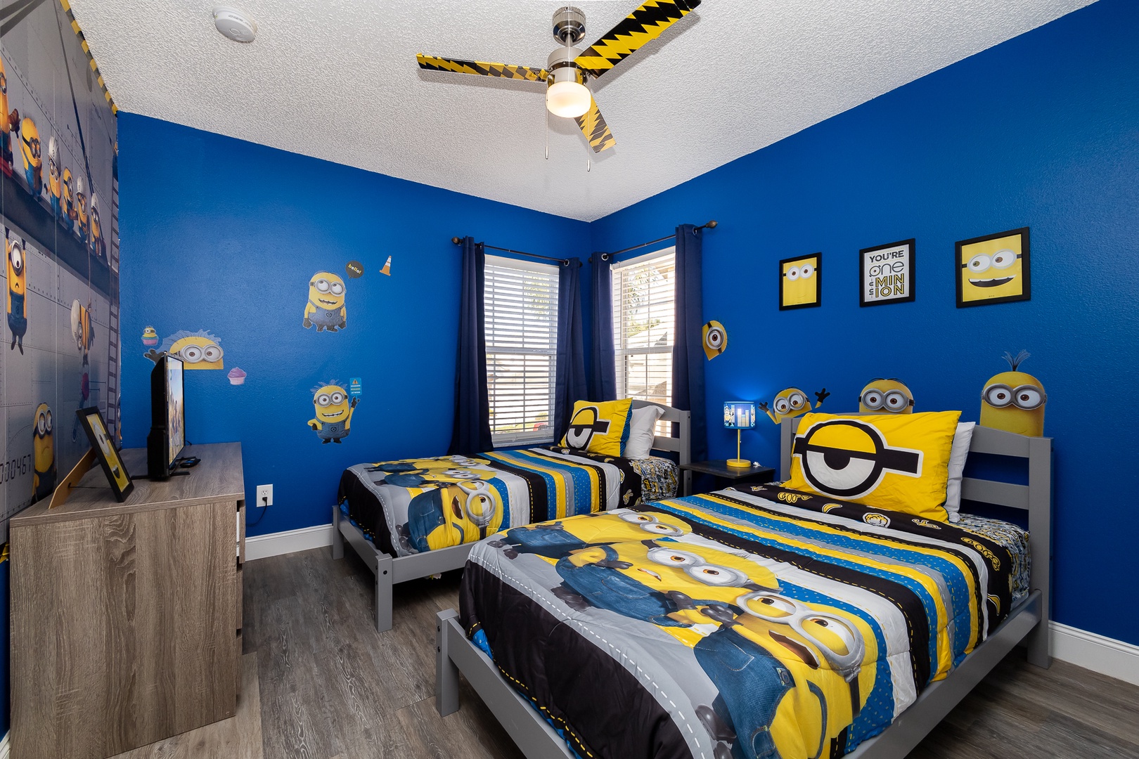 The Minions in your group will love this room’s plush twin beds & smart TV