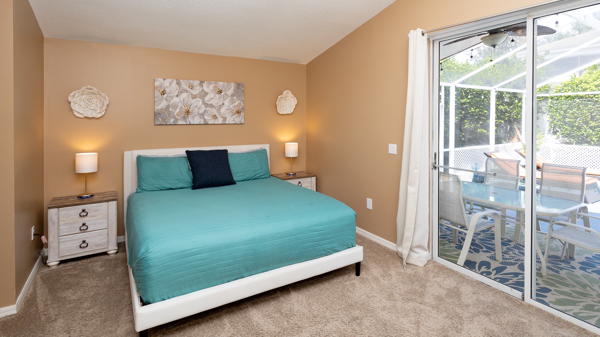 The king suite boasts a private ensuite, smart TV, & lanai access