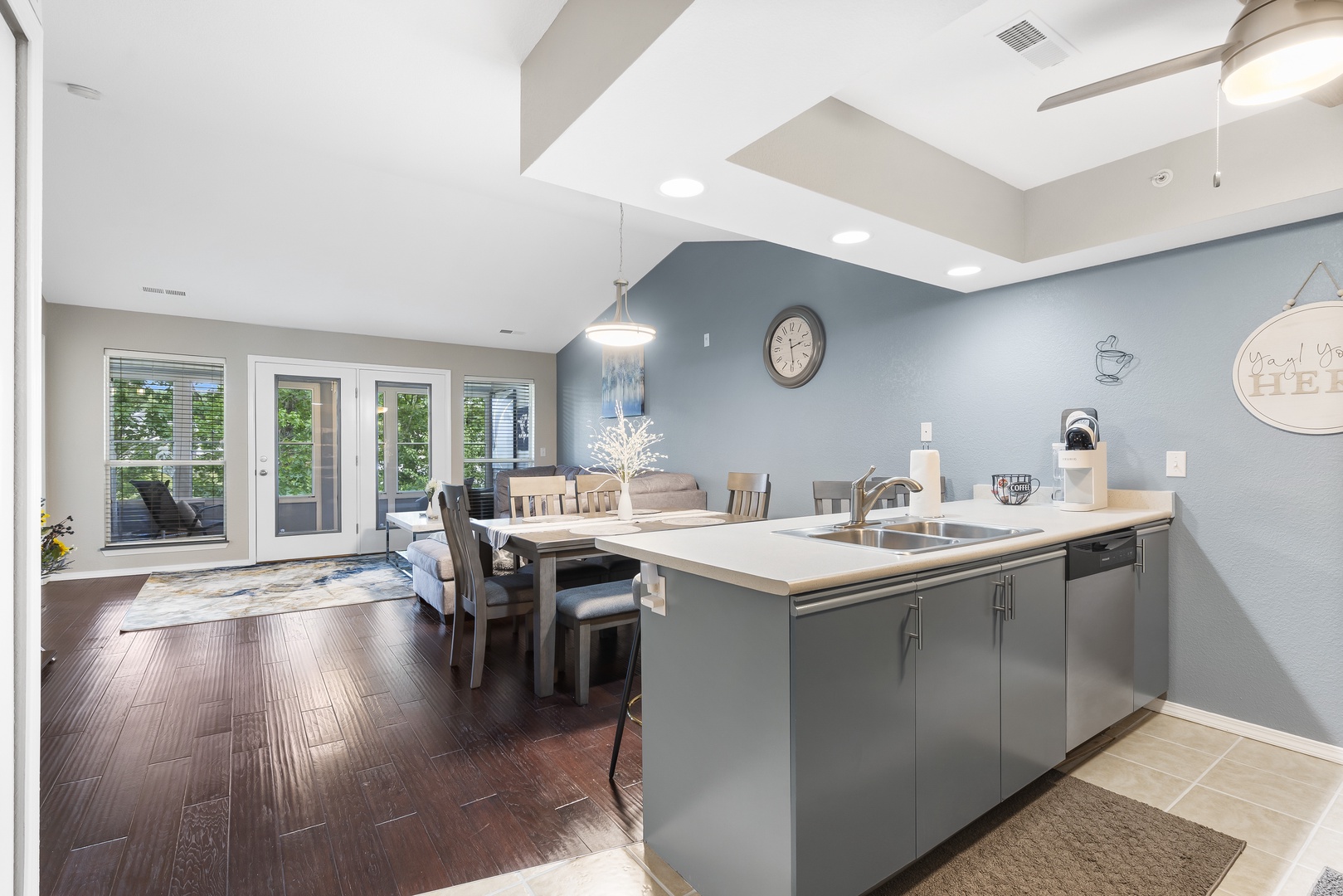 The serene open kitchen offers ample space & all the comforts of home