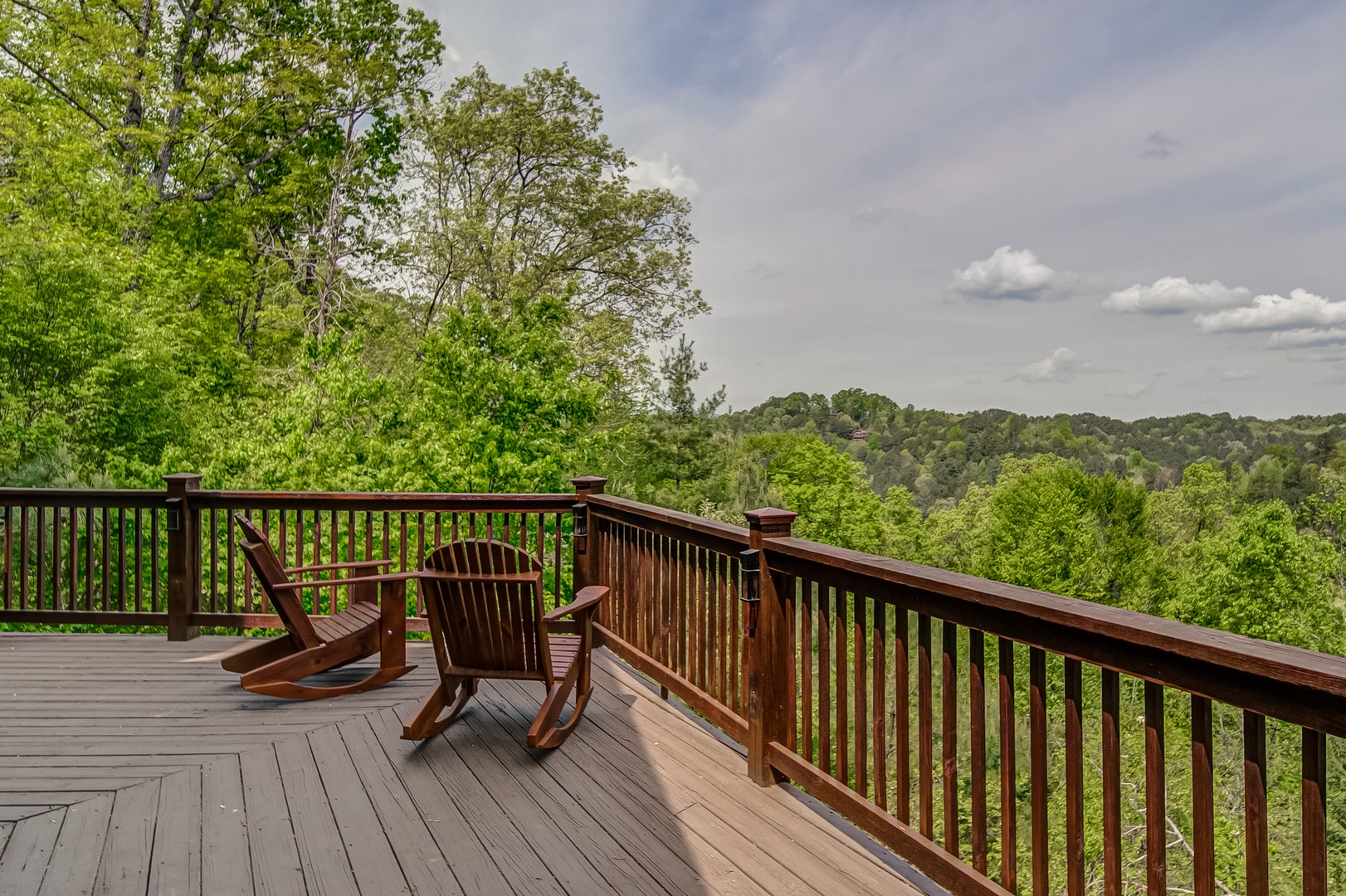 Wrap Around deck with treetop views