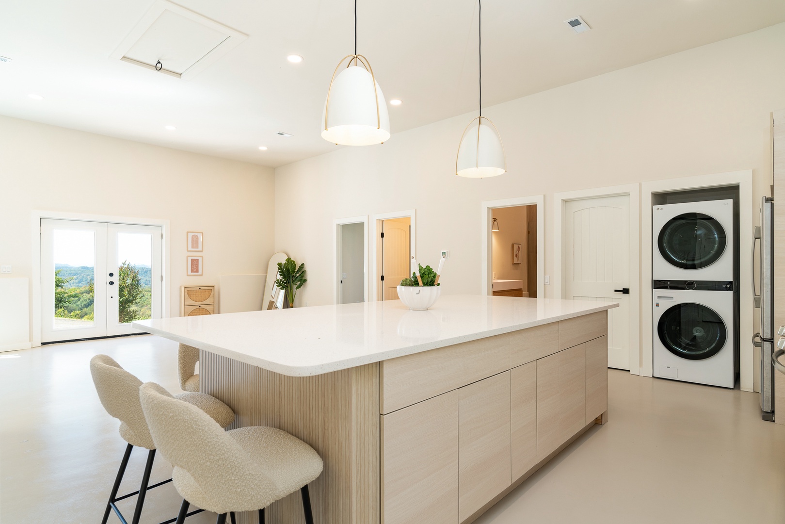 Enjoy mealtimes together at the spacious kitchen island, seating 6