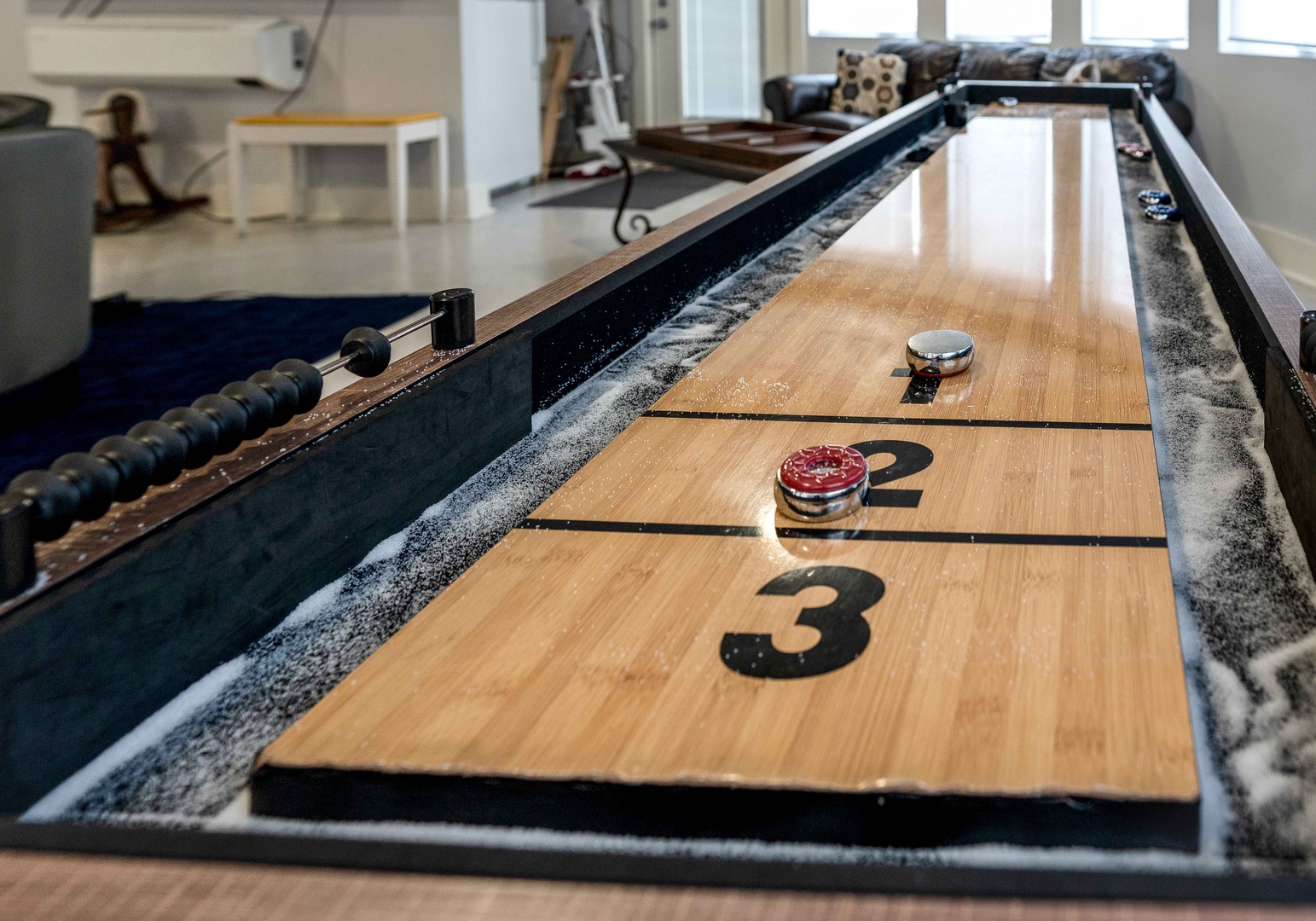 Challenge friends to a shuffleboard match in the game room #GameOn