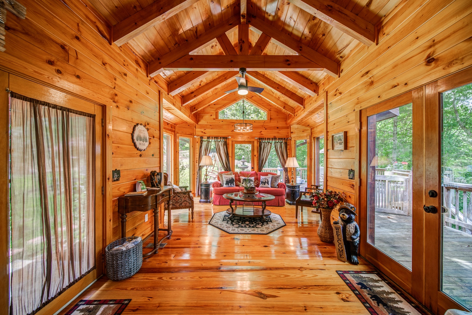Soaring vaulted ceilings & elegant cabin décor will delight in the sitting room