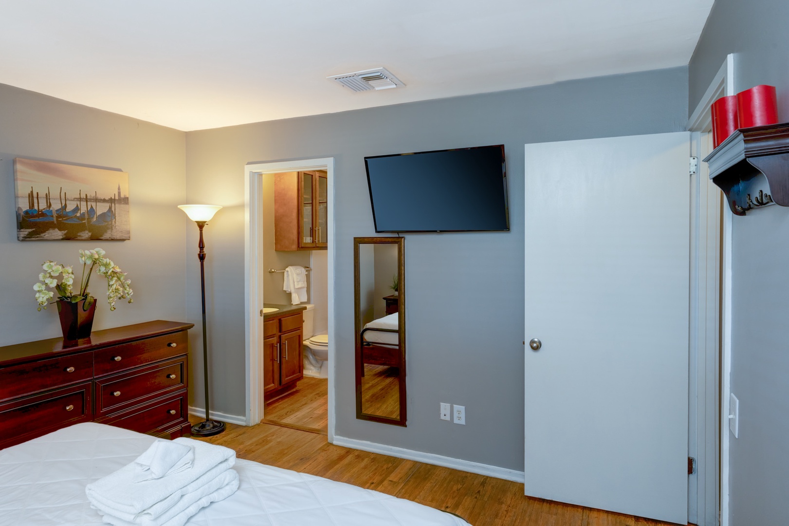 Bedroom with King bed TV, and en-suite
