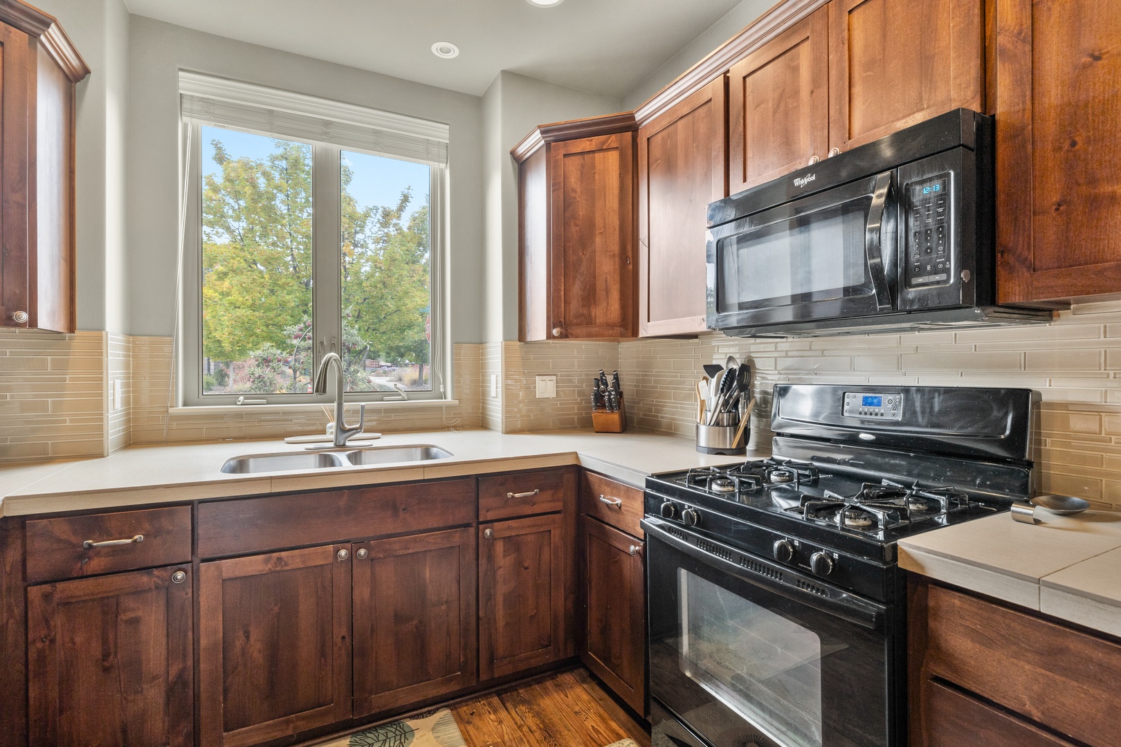 The kitchen offers ample storage/counter space & all the comforts of home