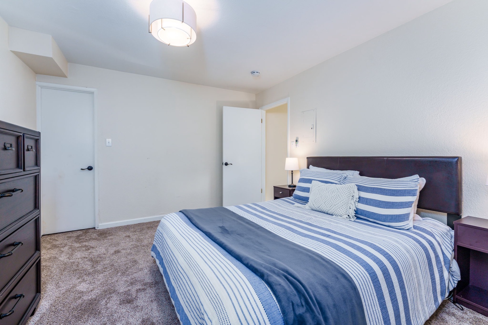 The 4th bedroom, off the Game Room, offers a Queen Bed and rollaway Twin Bed