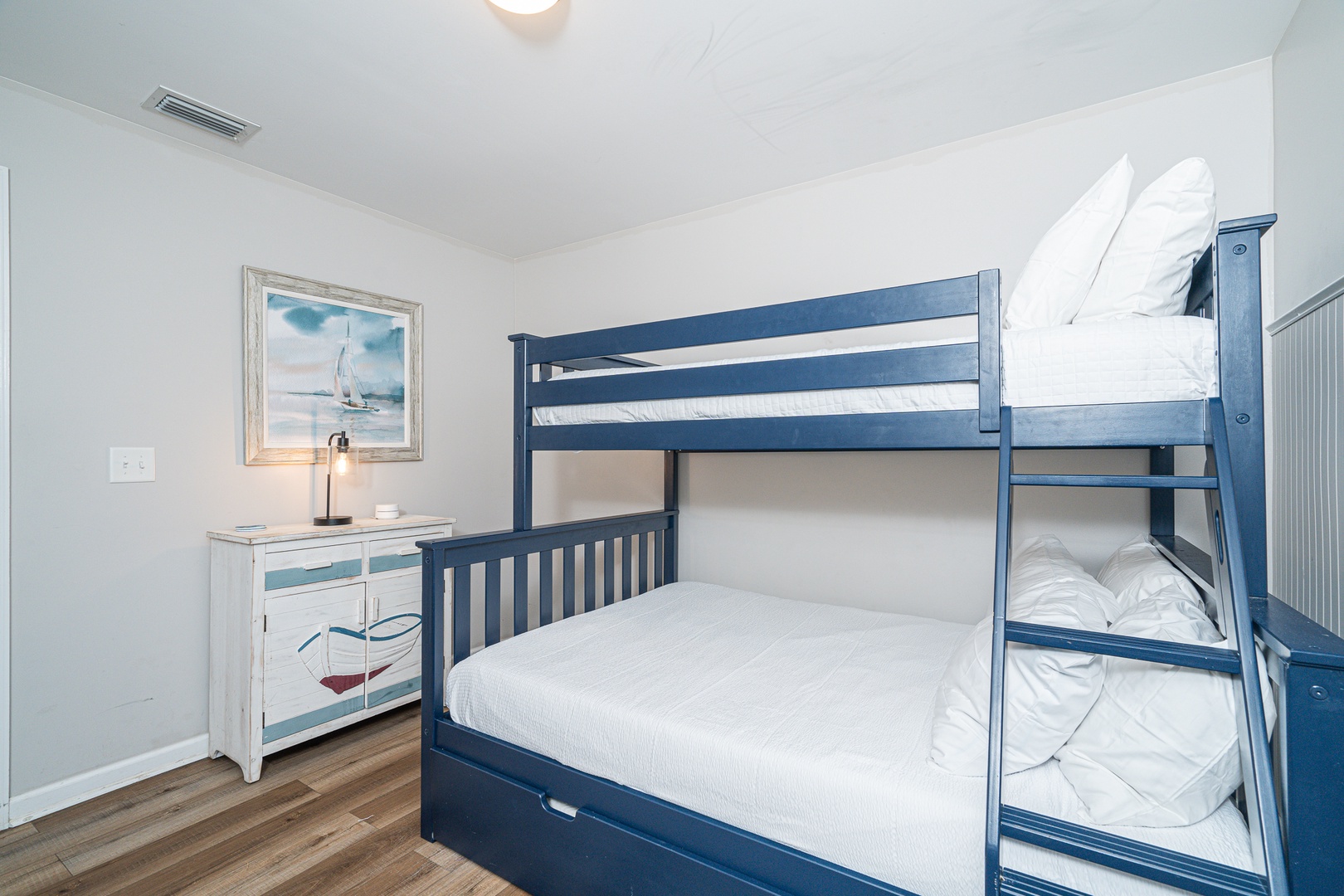 This 1st floor bedroom offers a twin-over-full bunkbed & twin trundle