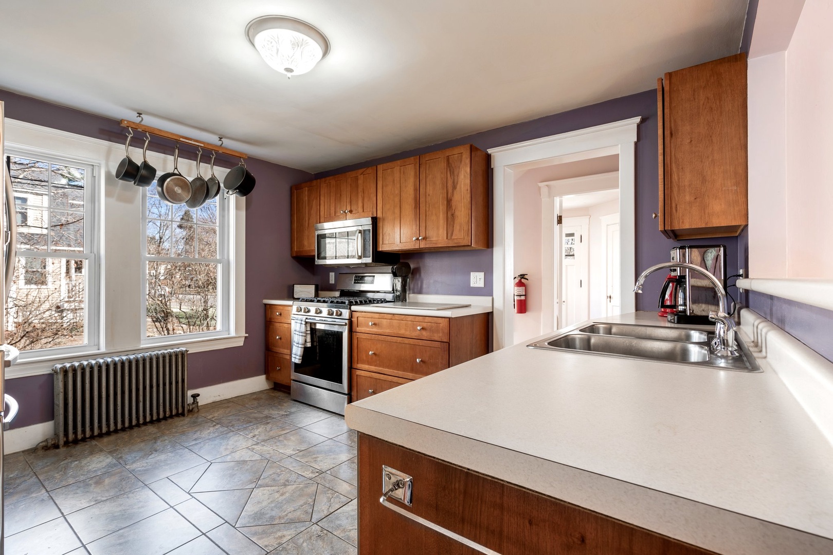 The open, airy kitchen offers ample space & all the comforts of home