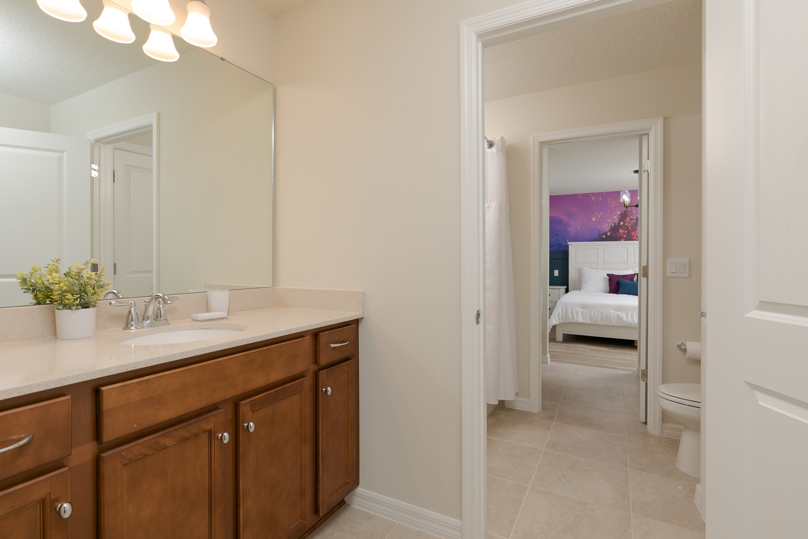 The 2nd floor Jack & Jill bathroom offers two vanities & a shower/tub combo