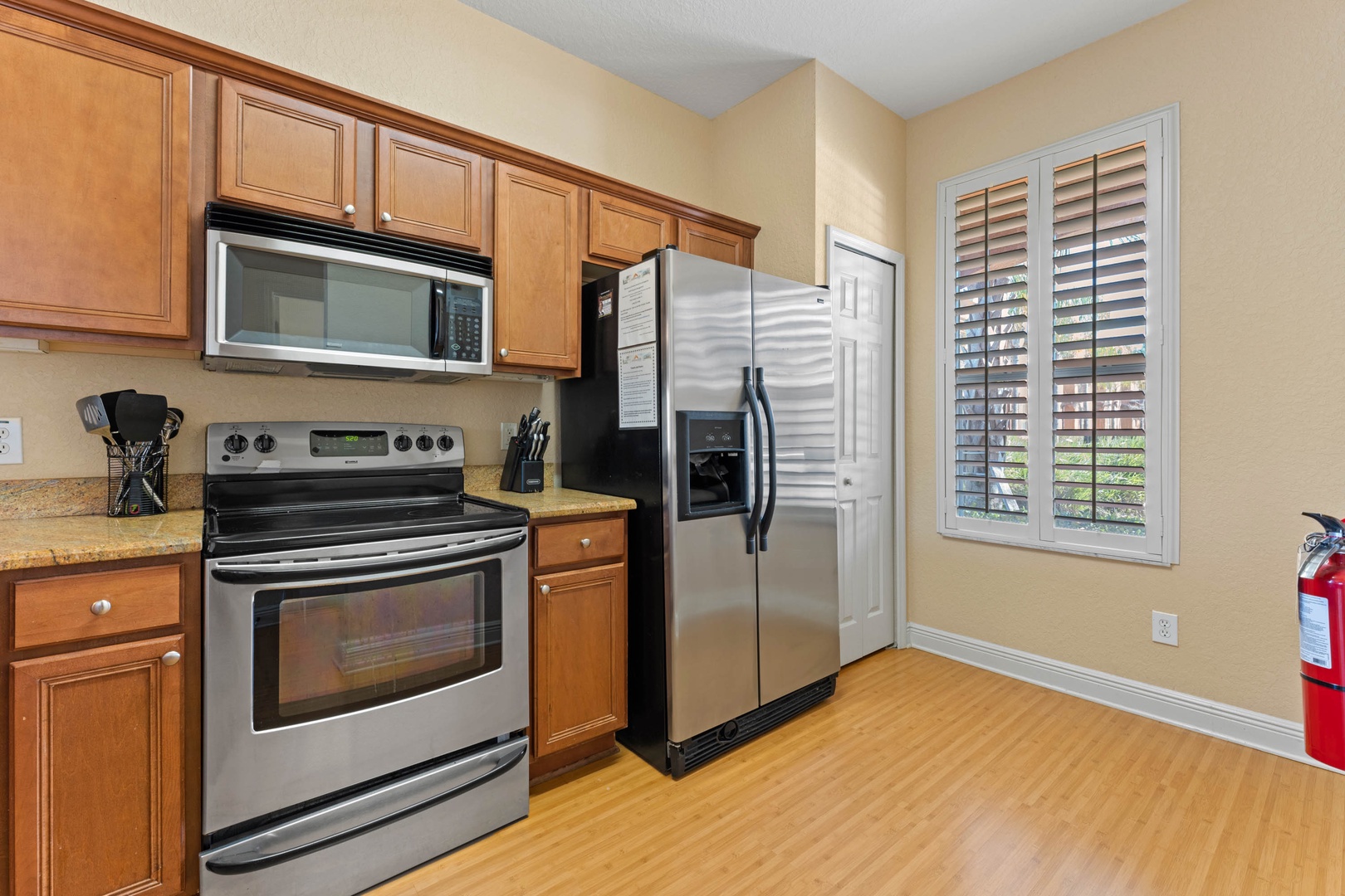 The updated kitchen offers loads of space & all the comforts of home