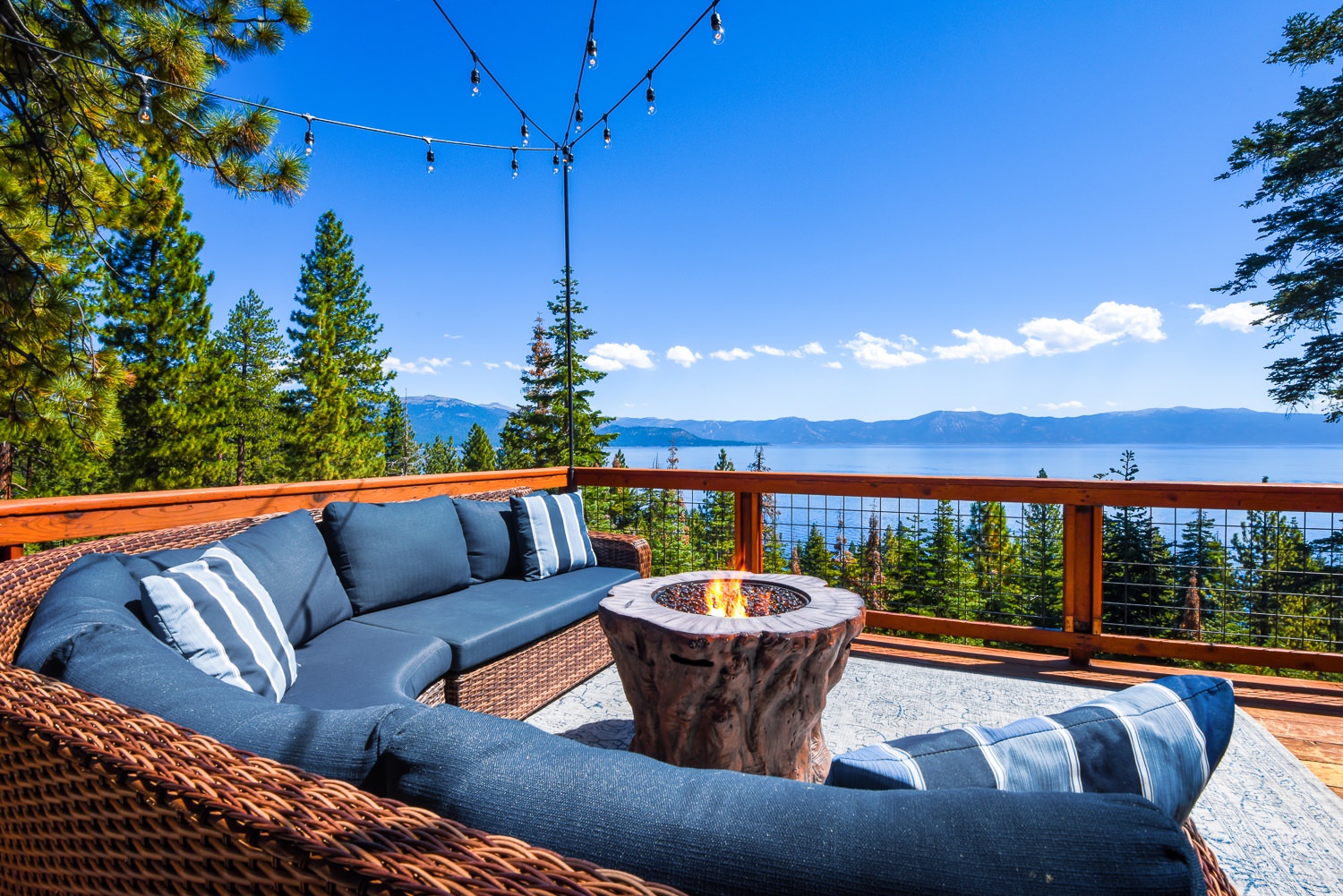 Stunning lake view deck with outdoor furniture