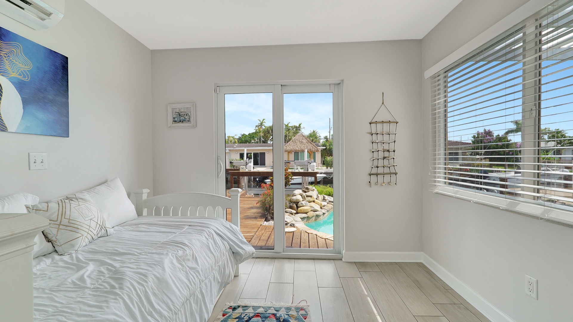 Bedroom 4 with full bed, trundle, and deck access