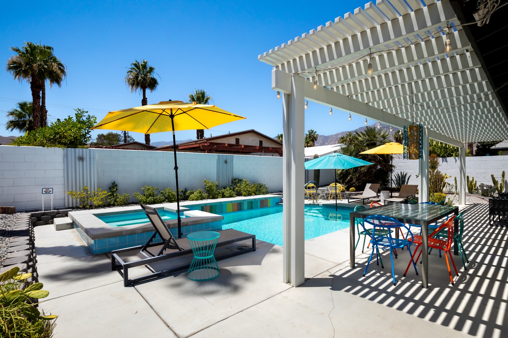 Poolside relaxation awaits, with comfortable lounge chairs for tanning