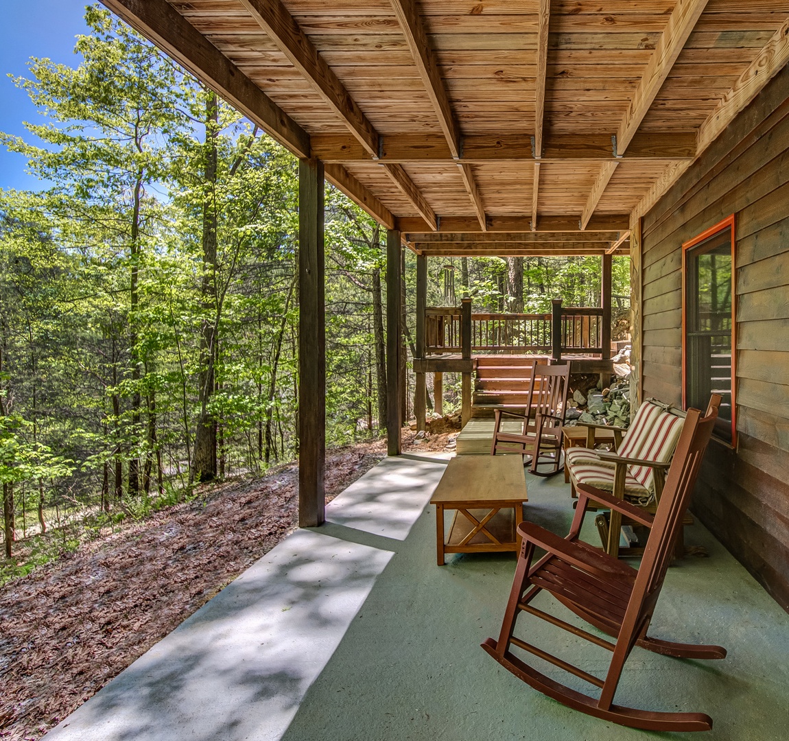 You will enjoy evenings together on the covered porch next to the hot tub
