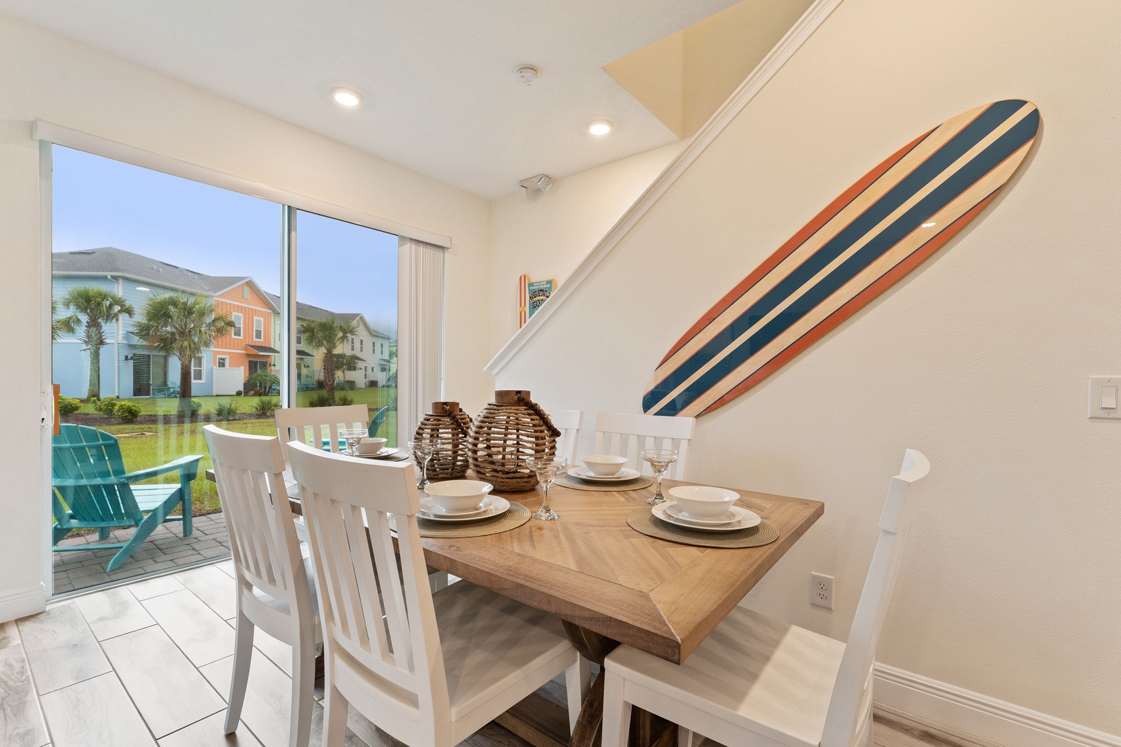 A chic dining table and chairs seats 6 for formal mealtimes