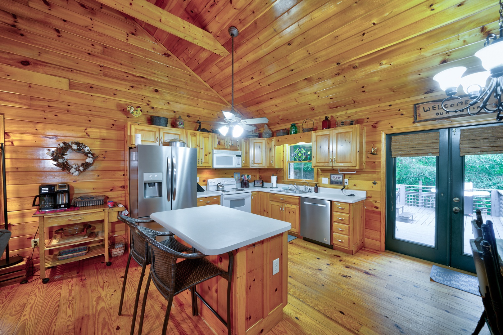 The inviting open kitchen offers ample space & all the comforts of home