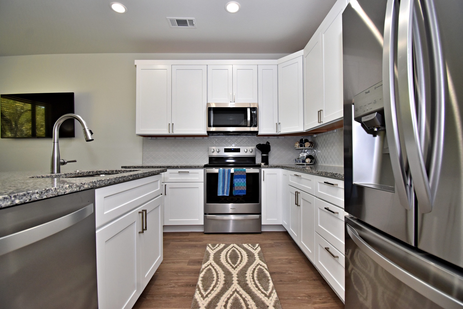 Full kitchen with stainless-steel appliances