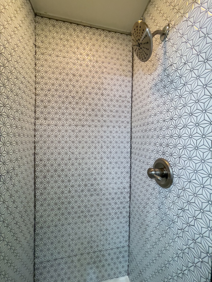 En suite master bathroom with standing shower