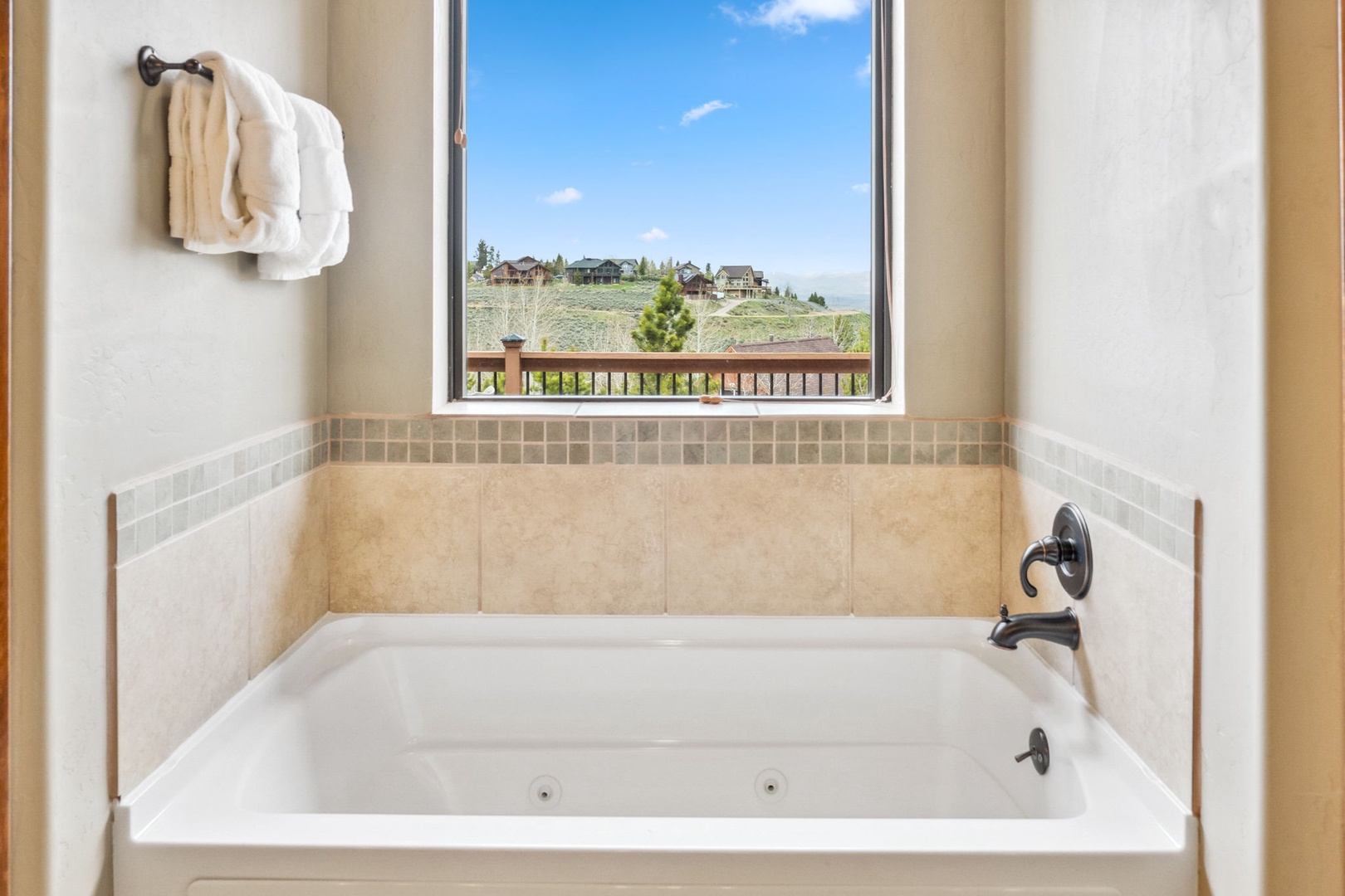 Wash up in the king ensuite, with a double vanity, shower, & soaking tub