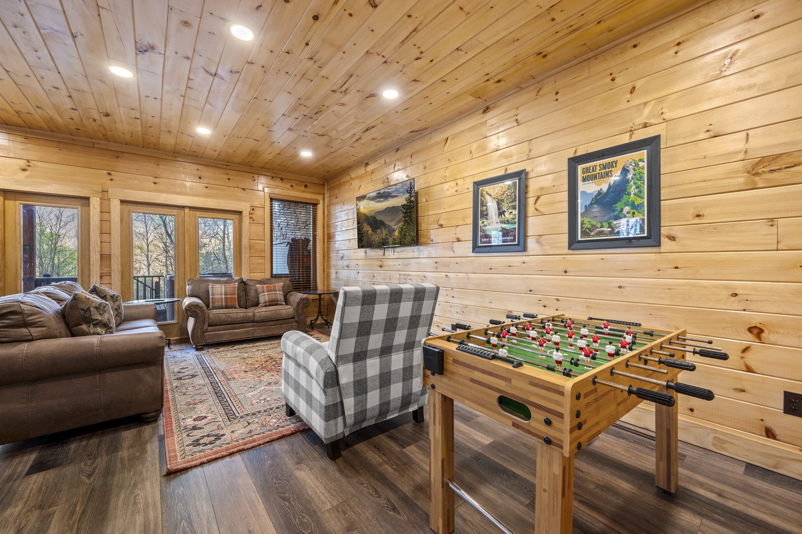 Basement game room with sofa sleeper, Smart TV, Foosball & more