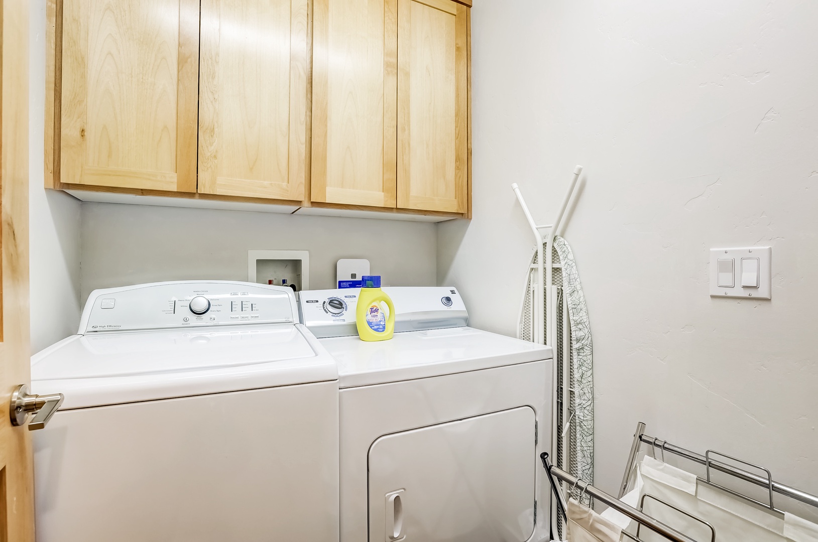Laundry room w/ washer, dryer, iron board