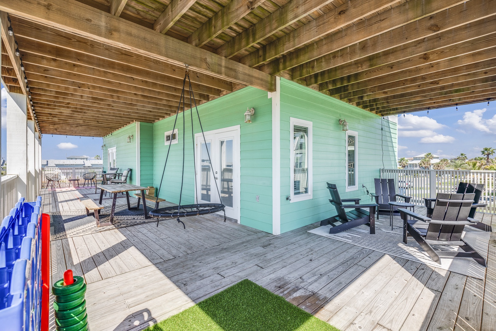 The 2nd Level Wraparound Deck is a perfect retreat, with space to lounge and play