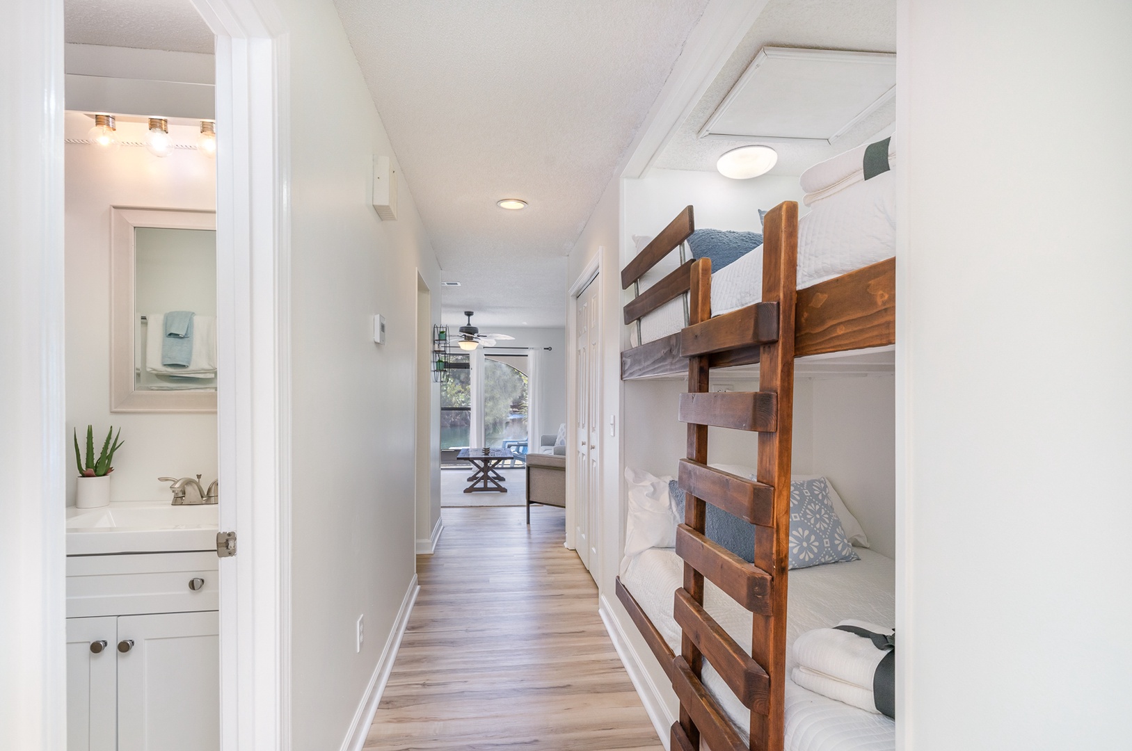 Cozy twin bunks await in the hallway sleeping nook