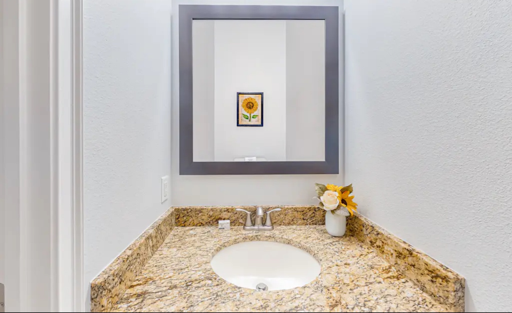 A convenient powder room is available on the first floor