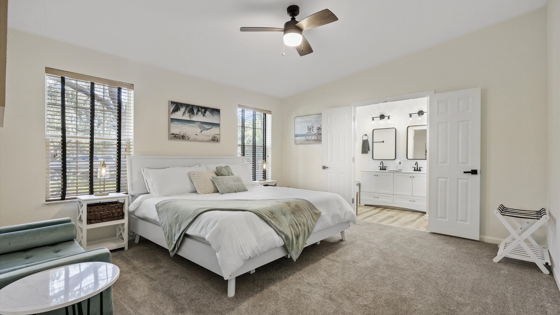 The master suite boasts a king-sized bed & luxurious private ensuite
