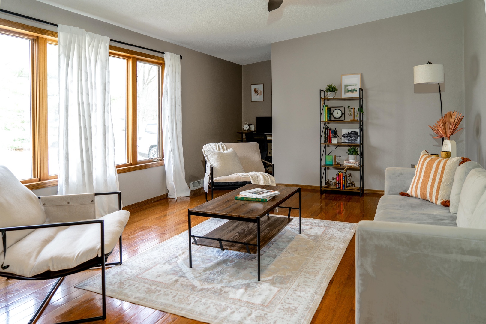 Enjoy relaxation in the second living room, complete with a workspace area