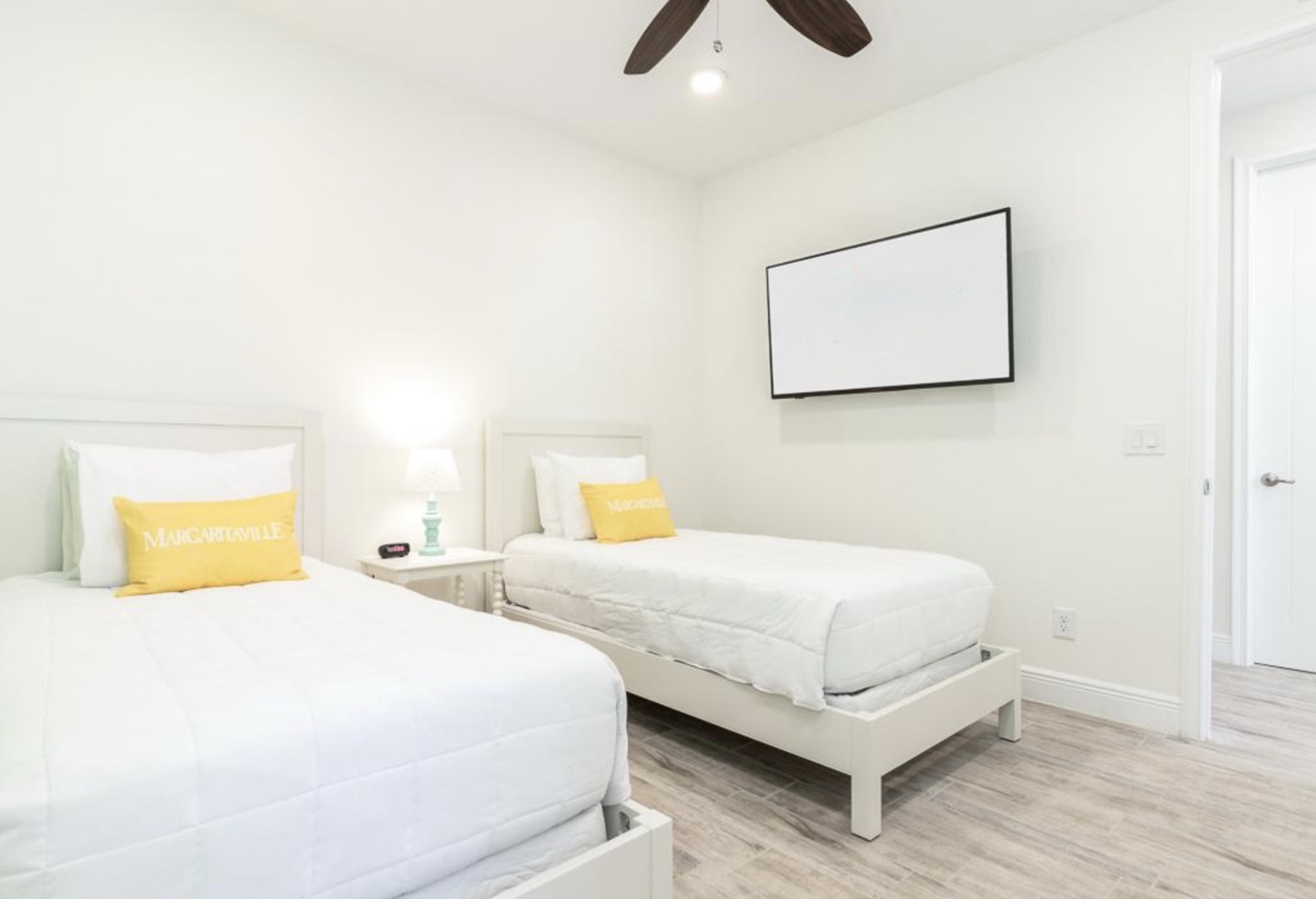 This 2nd floor bedroom suite offers two plush twin beds ensuite & smart TV