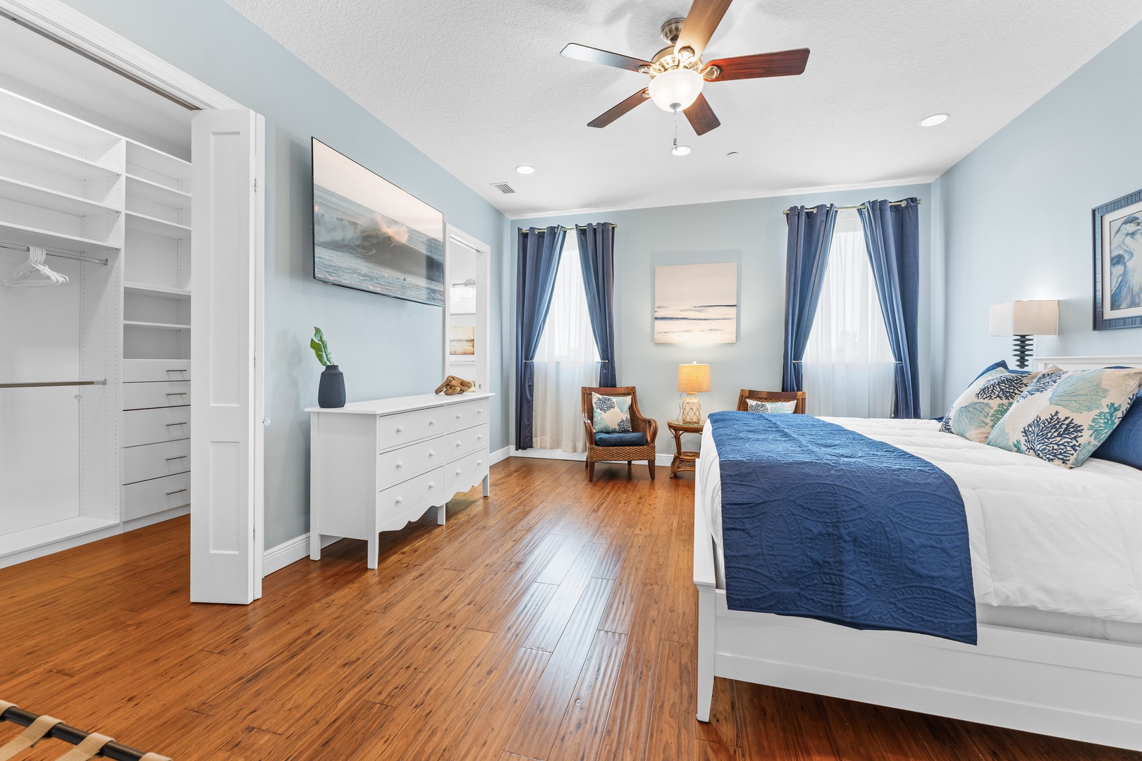 Bedroom 1 with king bed, TV, and ensuite